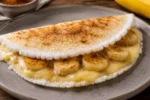 Tapioca com banana e queijo: o preparo gratinado que une sabor e saúde em minutos