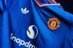 Manchester United revela design do uniforme reserva para a temporada 26/27