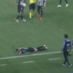 Cena de jogador caído no gramado marca momento de tensão em partida