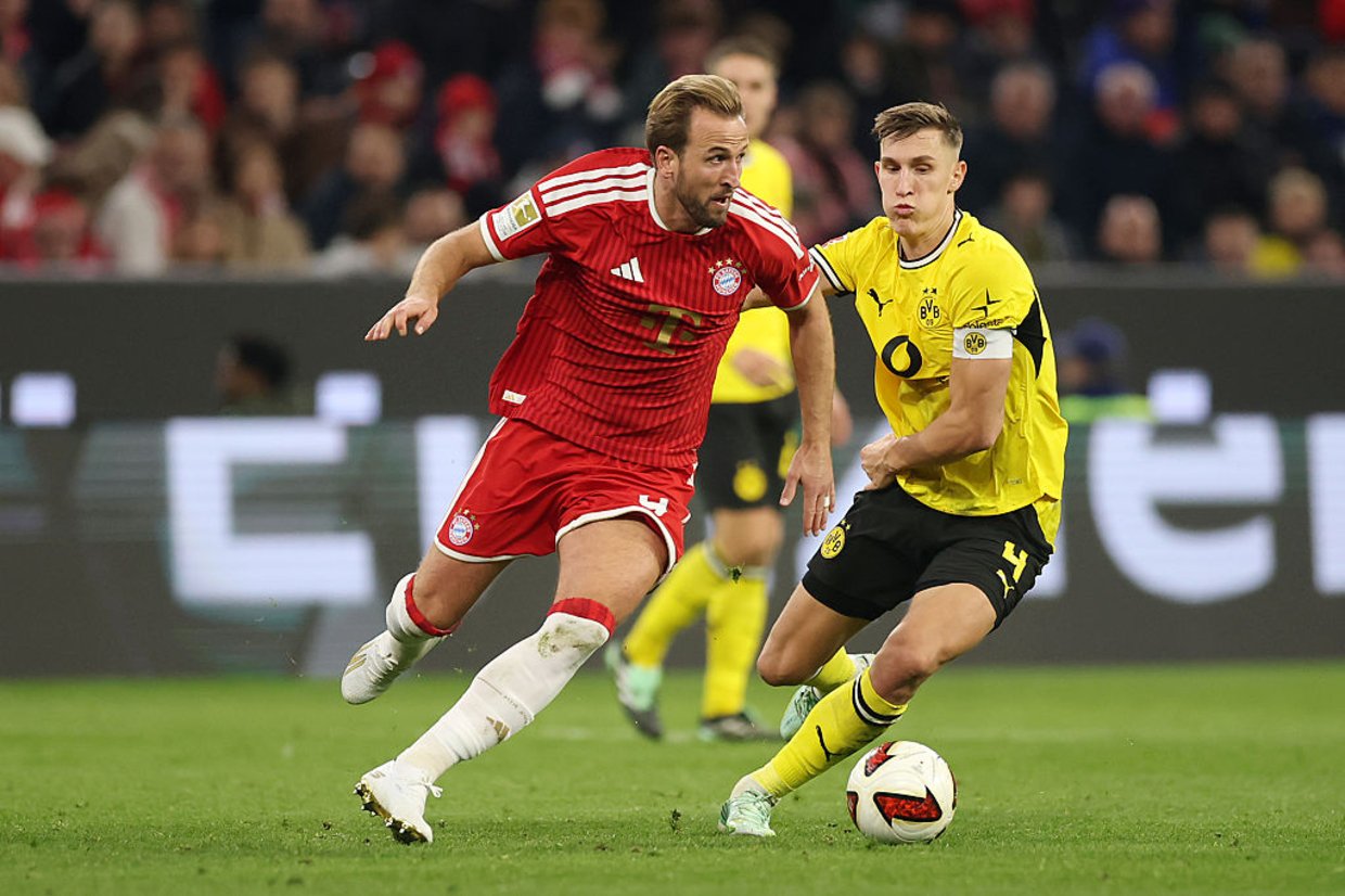Bayern e Dortmund empatam em clássico eletrizante e seguem líderes