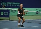Tenista comemora vitória na China pelo Junior Finals